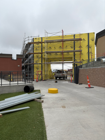 One of the sound mitigation structures at Ford Amphitheater, surrounded my construction equipment and scaffolding