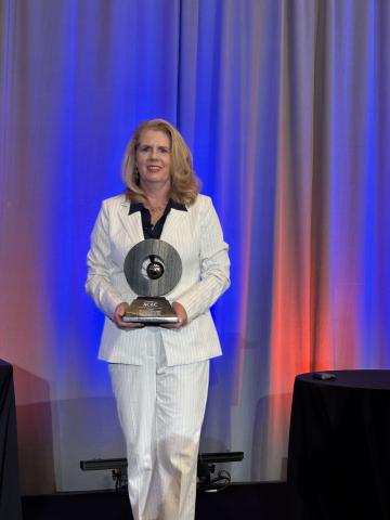 Gayle Sturdivant accepts the General Palmer Award. 